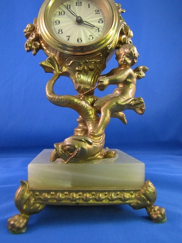 8.Figural Clock