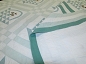 1. Embroidered Applique Basket Quilt