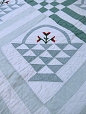 1. Embroidered Applique Basket Quilt