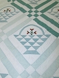 1. Embroidered Applique Basket Quilt
